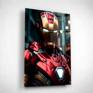May include: A close-up of a red and gold Iron Man character with glowing blue lights in the eyes. The character is wearing a red and gold suit of armour.