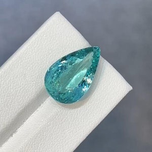 GIA Certified Natural Paraiba Tourmaline 15.18 Carat/Natural &indoor light photos,Videos taken from Iphone 13Pro-NO Added Any Fillters