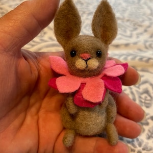 Needle felted brown bunny rabbit with pink flower petals
