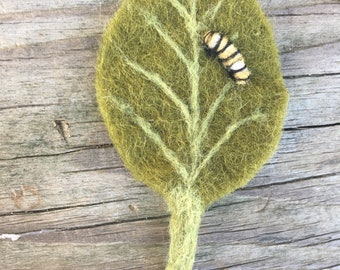 Baby monarch caterpillar on a leaf needle felted wool sculpture
