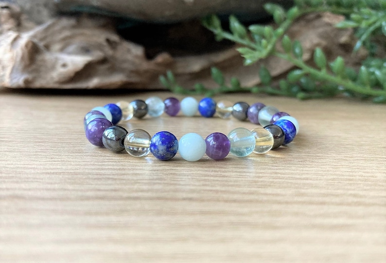 A gemstone bracelet made with flexible strong stretch cord with crystals to help with ADHD in both adults and children. Also good for anxiety and stress relief. Amazonite, Lapis, Lepidolite, Citrine, Hematite and Fluorite crystals have been used.