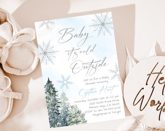 May include: A baby shower invitation with a winter theme. The invitation features a watercolour background with snowflakes and pine trees. The text reads "Baby it's cold outside" and includes the name "Cynthia Hart" and details for the shower.