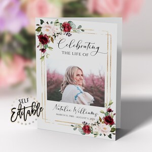 May include: A white card with a gold frame and floral border. The card says "Celebrating the life of" and has a photo of a woman. The text below the photo says "Natalie Williams, March 11, 1985 - August 5, 2019".