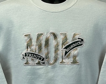 Sudadera vintage de los 90 con el logo de Trinity Shamrocks, estilo mamá, de instituto estadounidense, blanca, talla mediana para mujer.