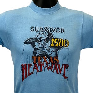 Vintage Survivor 1980 Texas Heat Wave T Shirt Mens XS X-Small Blue Hot Weather