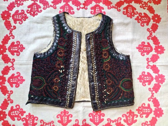 Really rare antique floral embroidered sheepskin H