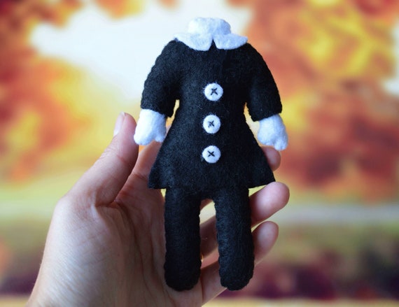 wednesday addams headless doll