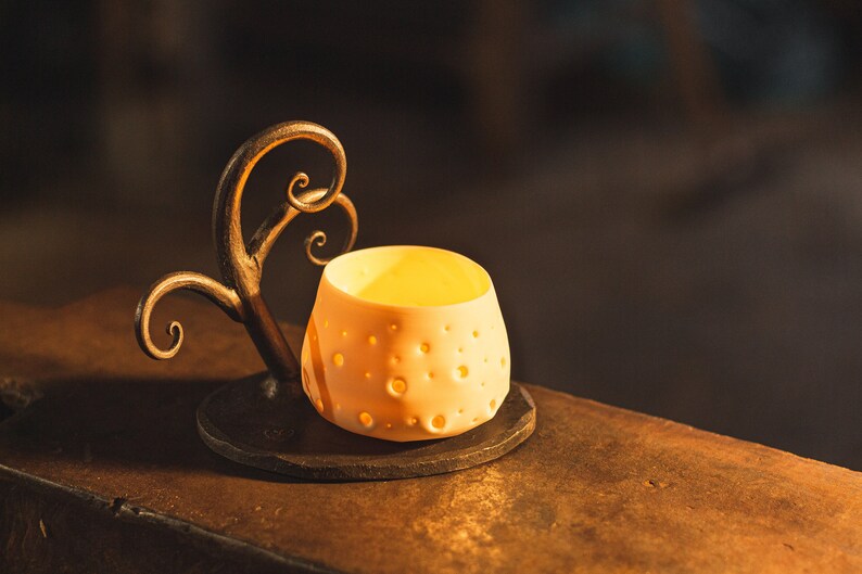 Fantasy - Sculpture in wrought metal and its candleholder Fantasy - Sculpture in wrought metal and its candleholder