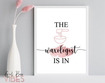May include: A white sign with black text that reads "The Waxologist is in". The text is in a cursive font. There is a pink watercolor-style background behind the word "waxologist". There is a pink outline of a bowl with wax dripping into it.