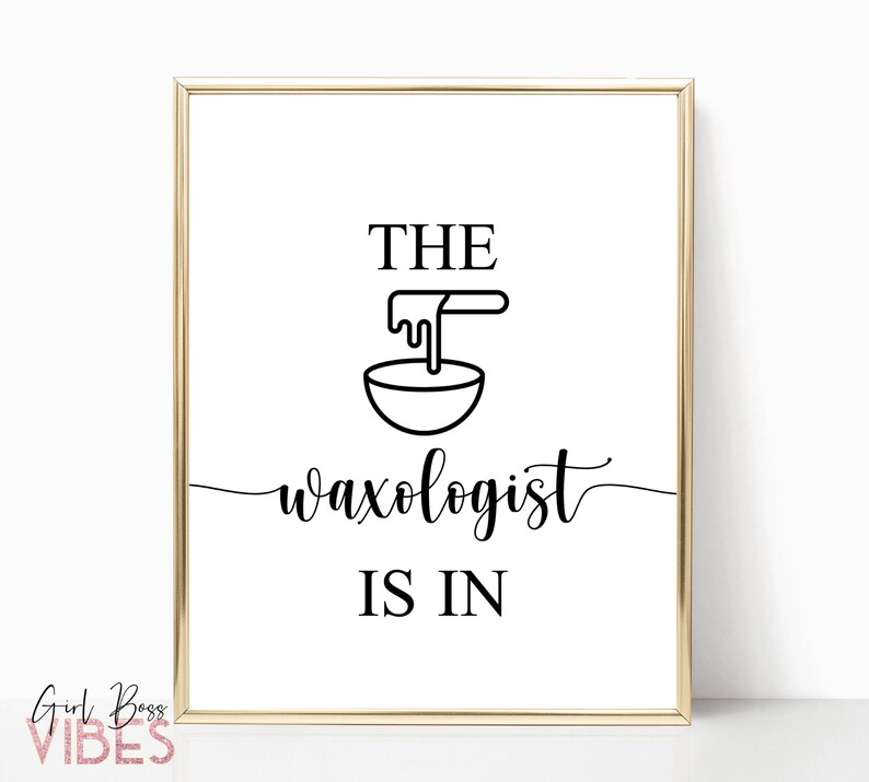 May include: A gold framed print with the text "The Waxologist is in" in black lettering. A black and white illustration of a bowl with wax dripping into it is above the text.