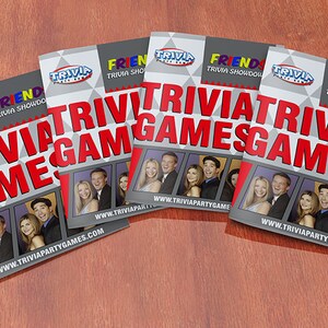 May include: Five red and gray game books with the title "Friends Trivia Games" and a website address. The books feature photos of the cast of the TV show "Friends".