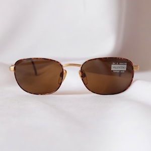 Authentic VALENTINO  Deadstock Gold Frame Vintage Oval Rare Sunglasses for both Women and Men  V679 906 SMALL 130