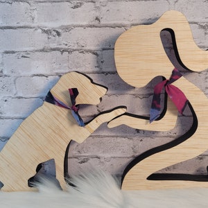 girl and dog multilayer wood statue.