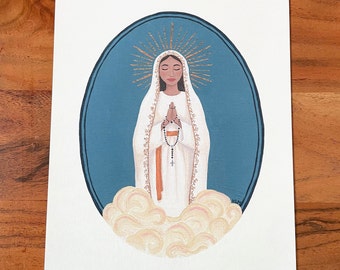 May include: A painting of the Virgin Mary in a white robe with a blue mantle, holding a rosary. She is surrounded by a golden halo and clouds. The background is a blue circle.