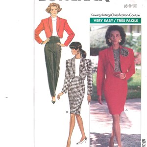 May include: Butterick sewing pattern 6580 featuring illustrations of women's suits and dresses. The cover includes the text "FAST & EASY" and "VERY EASY / TRÈS FACILE". The pattern size is (6-8-10).