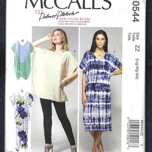 May include: McCall's sewing pattern M0544 size ZZ (Lrg-Xlg-Xxl) for a tunic top or dress. The pattern includes instructions for three different styles: a short-sleeved tunic with a V-neck, a long-sleeved tunic with a V-neck, and a long-sleeved dress with a V-neck.