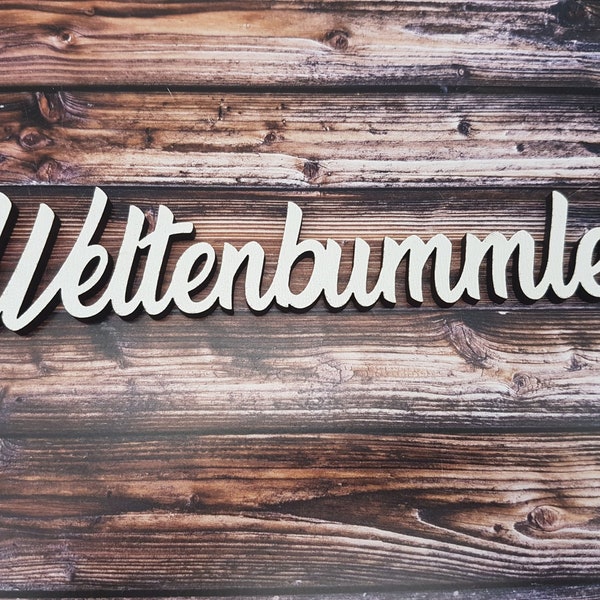 Schriftzug Weltenbummler/in aus Holz in weiß