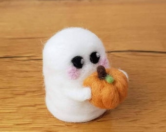 Needlefelt Ghost holding a Pumpkin