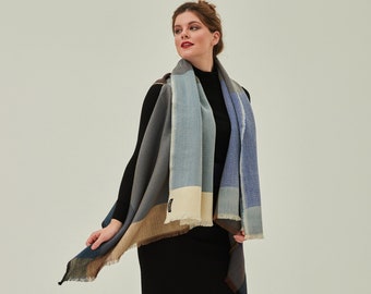 Daria Cape Danube. Versatile poncho Cape from pure soft wool. Stylish Cape for layering, work or travel. A meaningful gift for her.