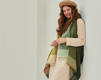 100% natural wool Daria Cape Amazon. Goes from poncho, to vest, to wrap, to shawl. One size, endless ways to wear.