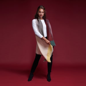 Daria Cape Seine. Multifunctional wool poncho that can be worn as a dress, wrap, vest, hoodie. Ideal for layering, travel, work, maternity