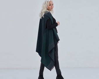 Daria Cape Zanskar. Multifunctional wool poncho that can be worn as a dress, wrap, vest, hoodie. Ideal for layering, travel, work, maternity