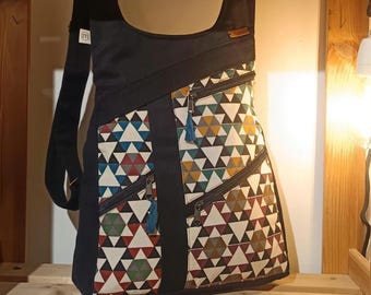 Zaino in cotone con numerose tasche. Zaino antifurto. Zaino vegano. Leggero e spazioso. Zaino multiuso.