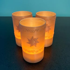 Tangled Lantern Tea Lights - Rapunzel’s Floating Lights - Three tan 3D printed lanterns with white LED tea lights. Natural wood look!