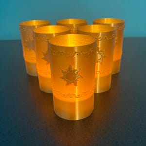 Tangled Lantern Tea Lights - Rapunzel’s Floating Lights - Six gold 3D printed lanterns with warm white LED tea lights.