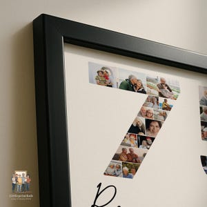 May include: A black framed wall art piece featuring a collage of various photographs arranged to form the number seven. The photos depict diverse individuals in different settings, set against a light cream background with black text below.