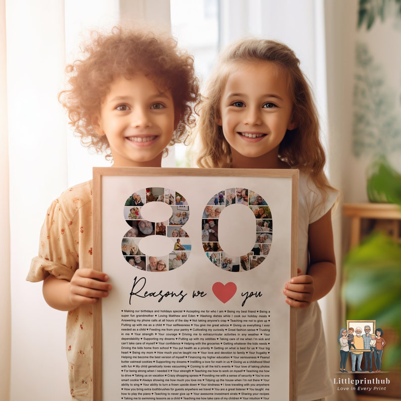 May include: A framed photo collage of 80 reasons to love someone. The collage is made up of small photos arranged in the shape of the number 80. The frame is white and has a black mat. The photo is surrounded by two children holding the frame. The text below the collage reads "80 Reasons we love you".
