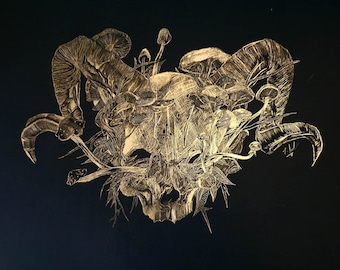 May include: A gold-toned illustration of a skull with mushrooms growing from it. The skull is surrounded by leaves and vines. The image is on a black background.
