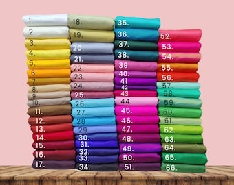 May include: A stack of 66 fabric swatches in various colors, numbered 1 through 66. The swatches are arranged in columns, with each column containing a different color.