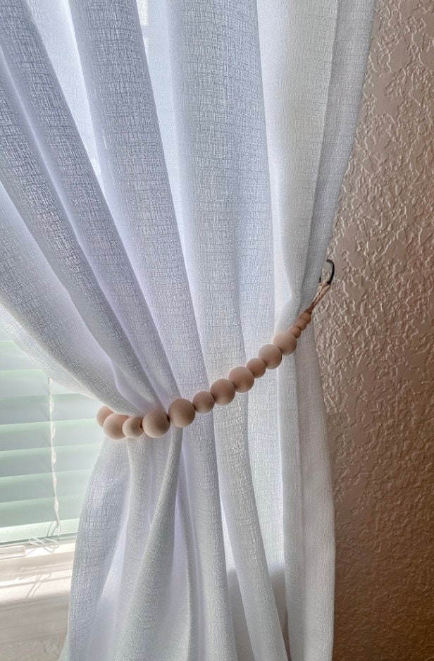 Two Curtain Hooks 
