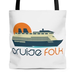 May include: White tote bag with a blue and white cruise ship graphic and an orange sunset. The text "cruise folk" is printed in blue and orange below the ship.