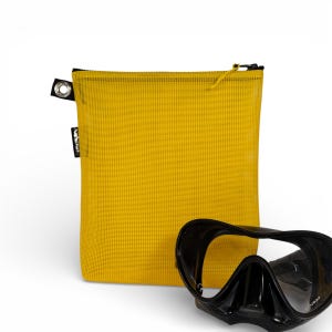 May include: A set of three ceramic mugs with a speckled, matte finish. The mugs are in shades of cream, light gray, and dark gray. Each mug has a simple, minimalist design and a rounded handle.