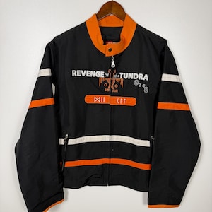 May include: A rustic wooden sign with the text "Welcome to our home" in white lettering. The sign features a distressed finish and a simple, inviting design, perfect for front door decor.