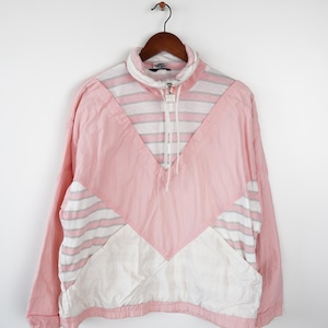 May include: A pink and white windbreaker jacket with a zipper closure and a striped pattern.