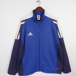 May include: A blue, white, and purple Adidas track jacket with a zipper closure and the Adidas logo on the front.
