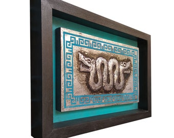 Two-headed serpent. Maquizcohuatl. Embossed on aluminum. Metal embossing. Aztec art. Aztec culture. Pre-Hispanic Mexico