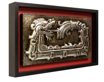 May include: A silver and gold framed wall art piece depicting a stylized dragon with intricate details. The dragon is set against a dark background and is framed in a black frame with a red mat.