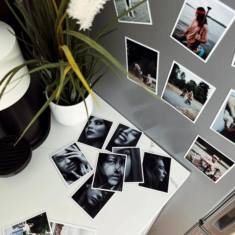 a collection of black and white photographs, including a potted plant, a coffee maker, and various people in different settings, all displayed on a refrigerator.