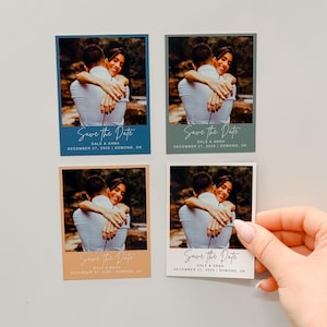 a hand holding a white card with a couple embracing, surrounded by four other cards with the same couple and text.
