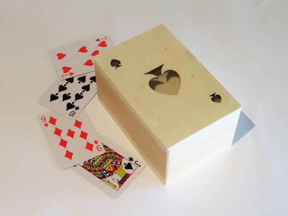 poker playing cards in cardboard box
