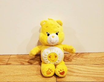 yellow care bear plush