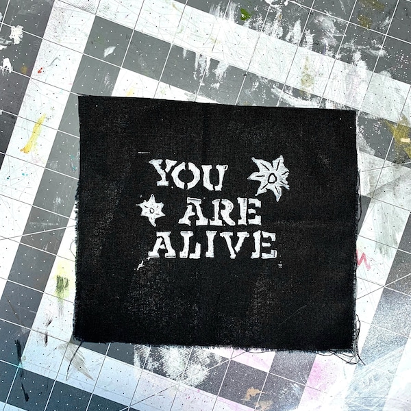 You are alive lino block print patch