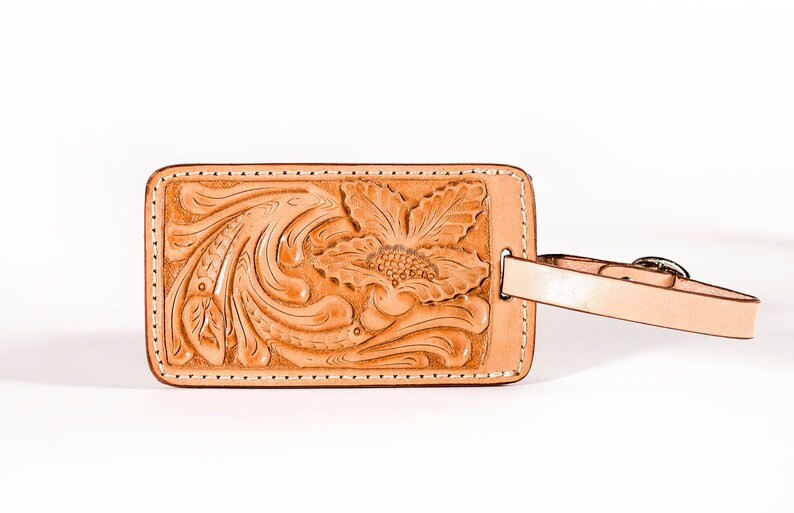 tooled leather luggage