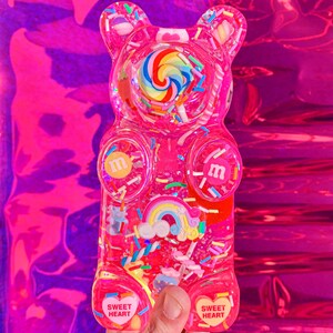 Giant resin gummy bear sculpture with fake candies - Pink pop art wall sculpture