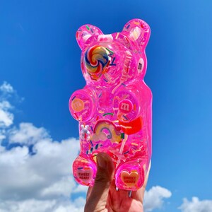 Giant resin gummy bear sculpture with fake candies - Pink pop art wall sculpture