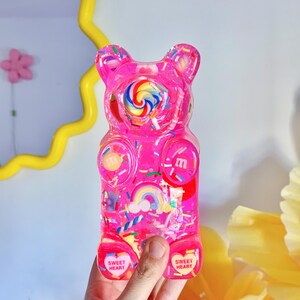 Giant resin gummy bear sculpture with fake candies - Pink pop art wall sculpture
